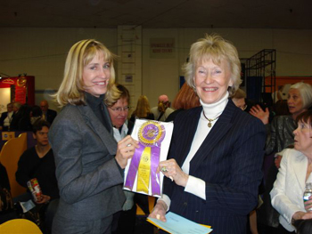 Elyse with award at dog show